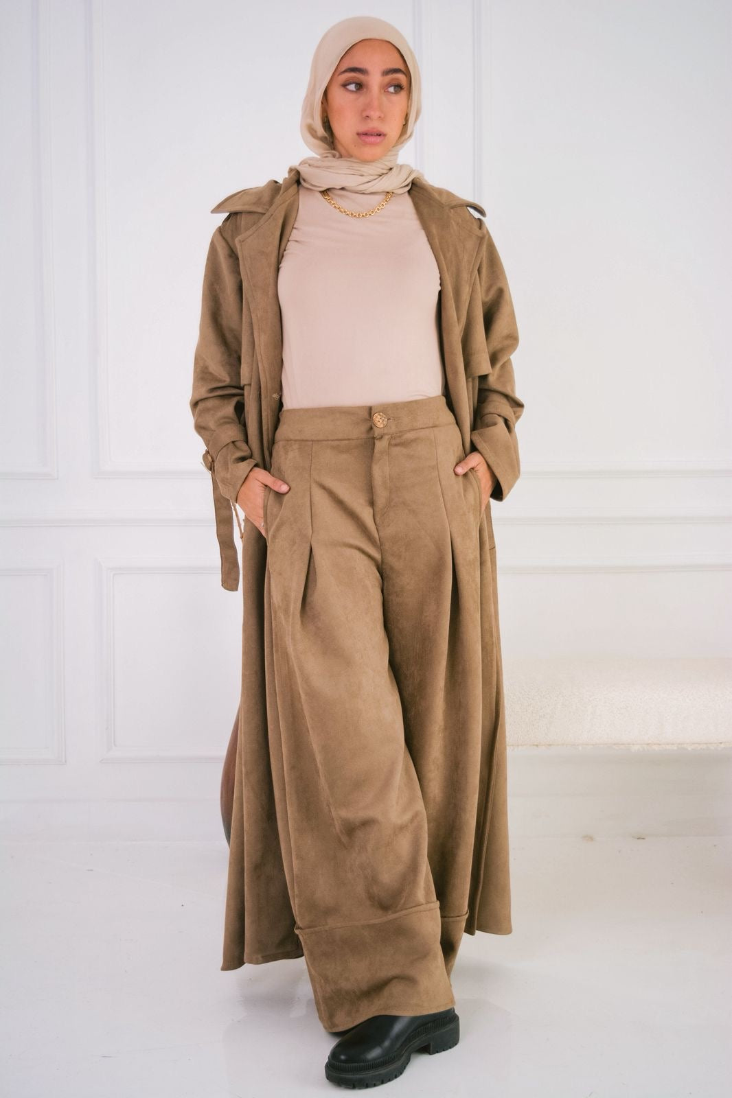 Suede trench coat in cafe