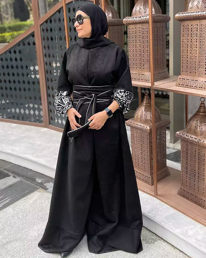 Suede jumpsuit with kuffi calligraphy