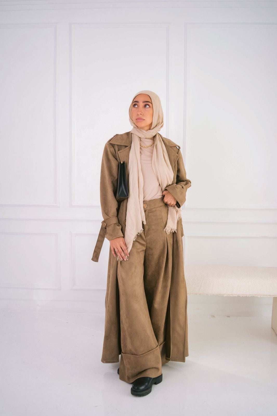 Suede trench coat in cafe