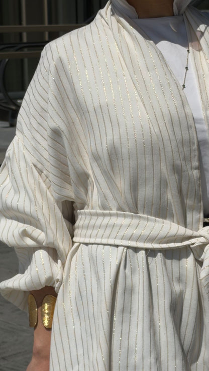 The Glow Cardigan in gold
