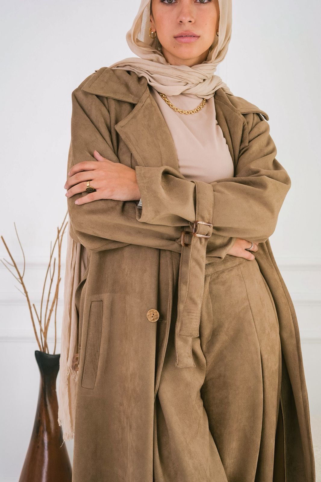 Suede trench coat in cafe