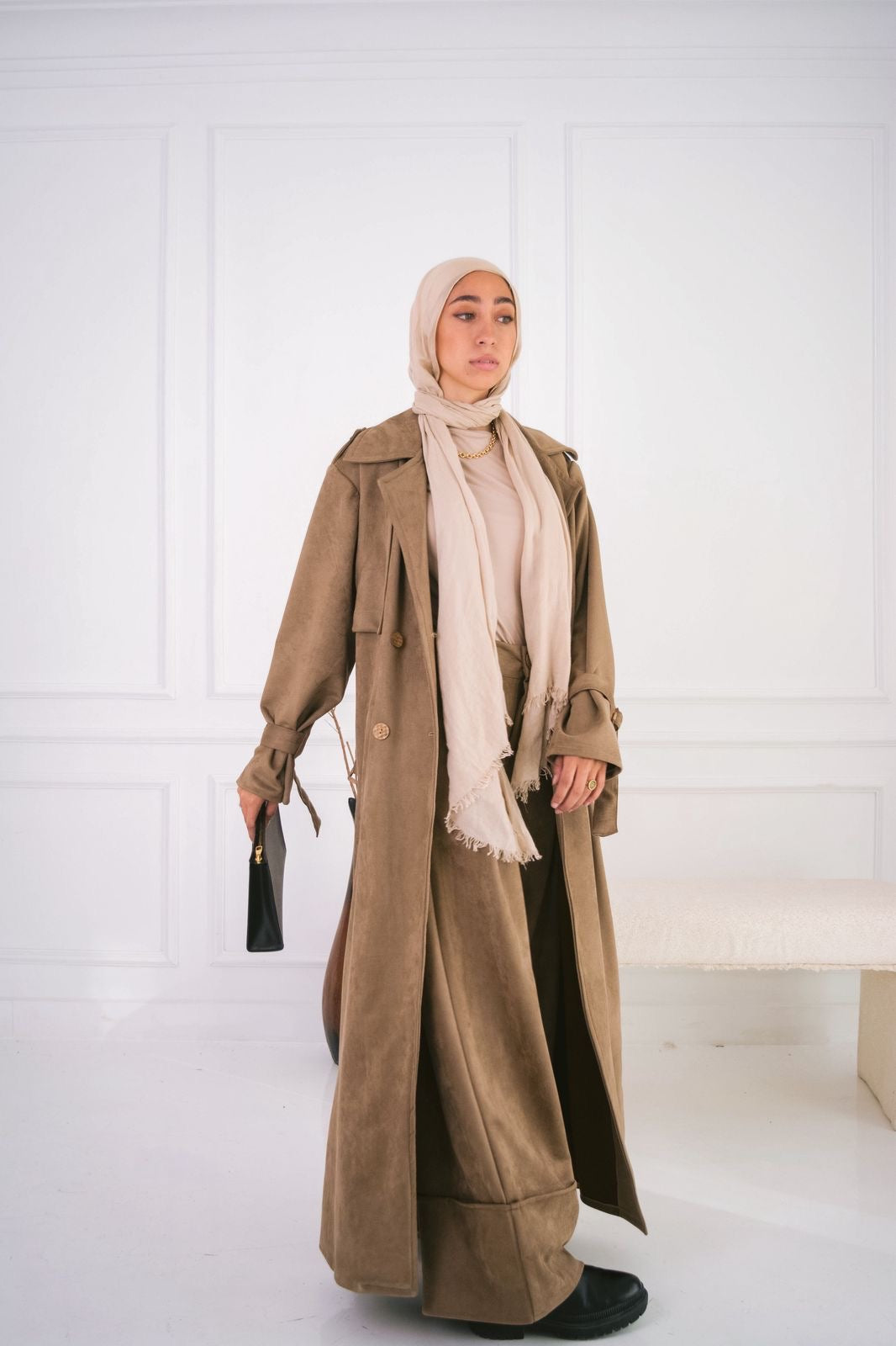 Suede trench coat in cafe